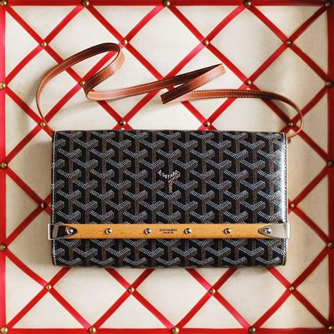 buy goyard clutch bag